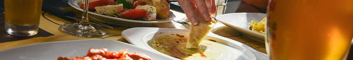 Eating Food Stand at Á La Cart World Street Food restaurant in Taos, NM.